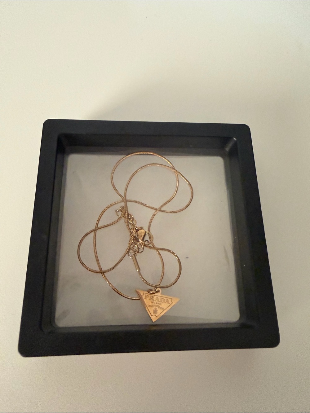 Gold Triangle Logo Pendant Necklace